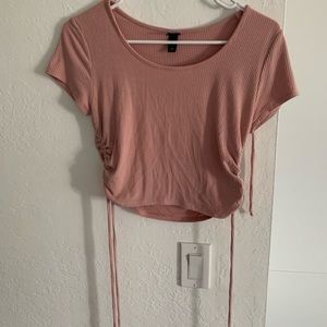 Pink crop top (tie strings on the side)